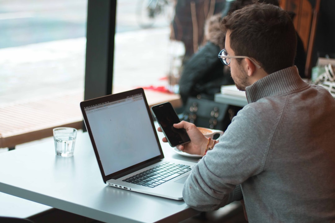 Azure cloud developer working on laptop